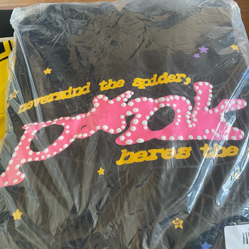 Black Graphic Tee with Pink and Yellow Design